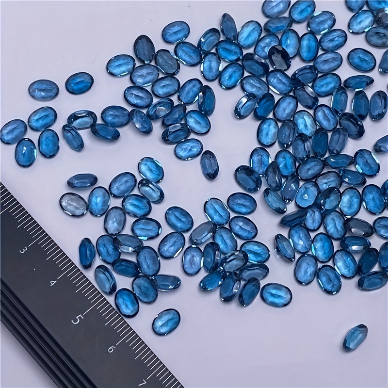 1 على شكل توباز بيضاوي أزرق طب - مراجعة Jewelry Making In London وسعره